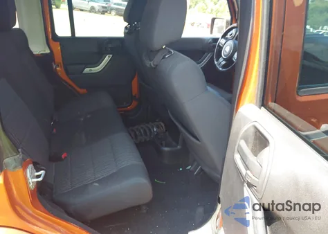 2011 Jeep Wrangler Unlimited Sahara из США, поврежденный, VIN 1J4BA5H15BL588327